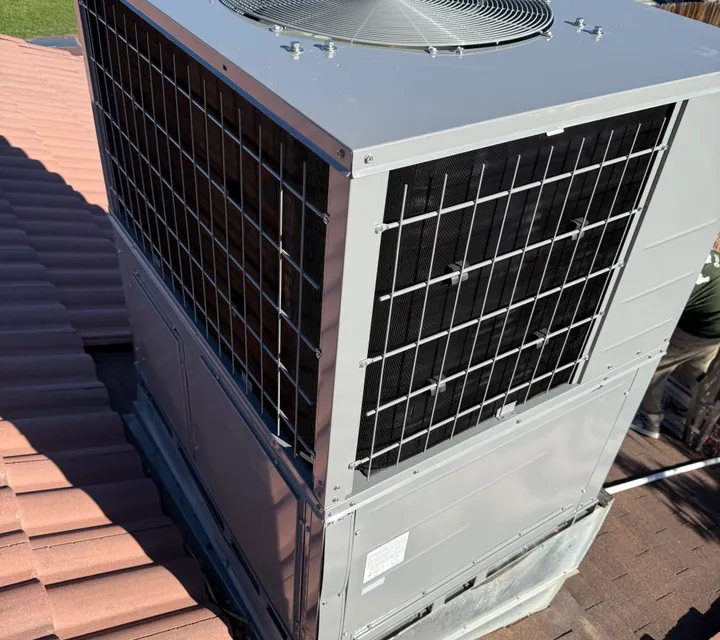 Rooftop HVAC package unit being installed on a new-construction home in Southern Utah
